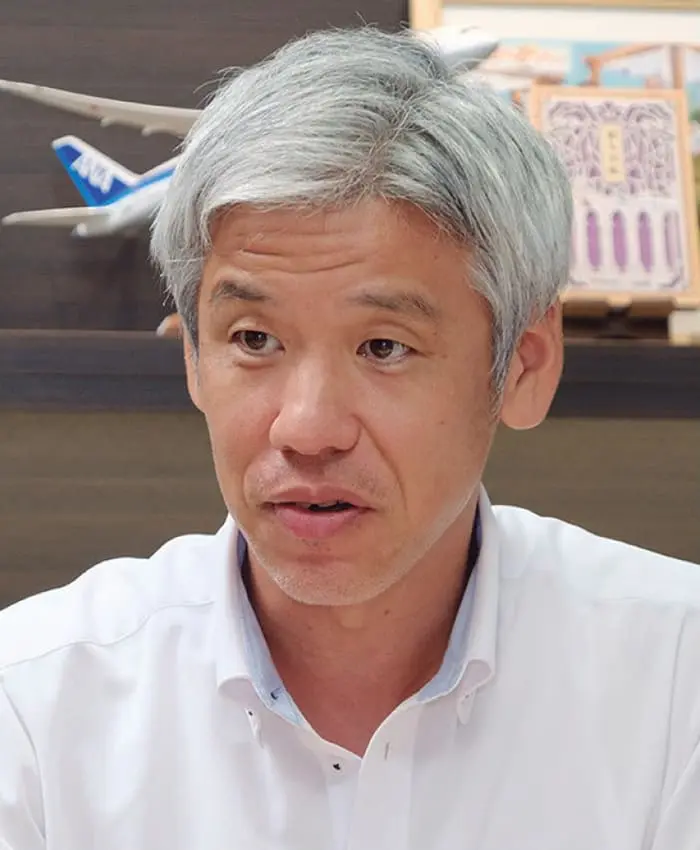 企画開発部部長 𠮷村昭二様